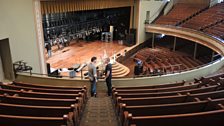 Patrick and Peter Cooper chat in Ryman Auditorium