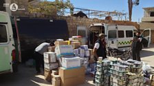 Unloading aid in Syria