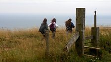 Sarah, Abi and Irum walking