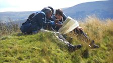 Isaac, Ruby and Eddie check their map