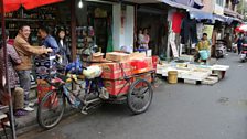 Delivery Man in Ding Hai Road Market, Shanghai