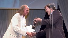 John Tavener receiving the Ivor Novello Award in 2005 for Achievement in Classical Music.