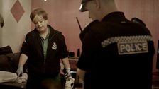 Paramedic Suzy Hope attends to the victim of a knife attack.