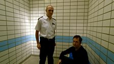 Custody Sergeant Damon Goodman-Anders with Matt Allwright in a Wandsworth Custody Suite Detention Cell, London