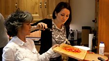 Marina Chapman and her daughter Vanessa prepare a traditional Columbian dish of chicken and chickpeas.