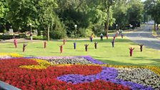 Coloured Wagner 'gnomes' scattered across the Grüner Hügel at Bayreuth