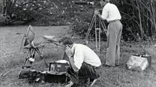 David Attenborough with cameraman Charles Lagus filming Zoo Quest.