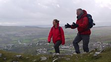 Beccy and Derek climb onto the remains of Morlais Castle’s ramparts