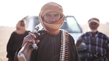 Bedouin guide with gun.