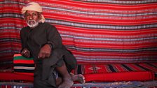 Bedouin at camel training camp, Empty Quarter, Oman.