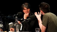 Brian Cox listens to Simon Watt