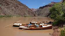 The boats at rest on the river.