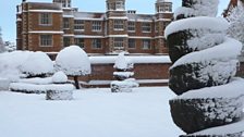 The house covered in a layer of snow