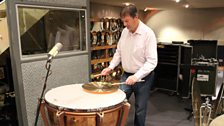 Steve plays an upturned cymbal on a timpani head for a unique sound