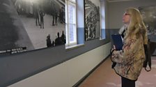 Rev Ruth Scott reading one of the displays in one of the Barrack Blocks in Auschwitz 1