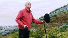 Chris Watson preparing to record grassland birds at Husavik