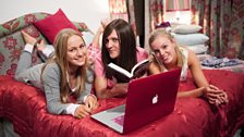 Sleepover time – Ja’mie cosies up with The Hunger Games and the girls.