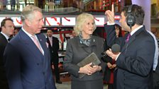 HRH The Prince of Wales and The Duchess of Cornwall with Ros Atkins