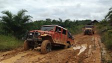 Truck stuck in mud in Sumatra