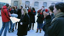 Sue and the choir celebrate