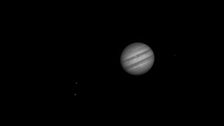 Jupiter and four of its moons