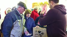 A brisk trade in Rhubarb! Tourists flock to snap up a crips pink stalk