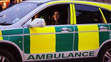 Paramedic Mark Whytock and Julia Bradbury in a fast response car, Edinburgh