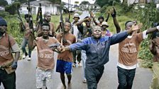 LURD fighters set off from Tubmanberg for an attack on Monrovia, Liberia. A lack of transport meant the attack is made on foot.