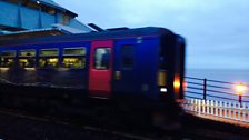 One of the first trains to pass over the newly repaired track