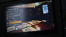 A through-the-camera-monitor-view of The Governors’ Room