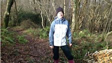 Harpist and composer Sarah Deere-Jones in woodland near her home