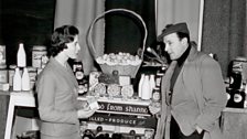 Gene Kelly samples Shannon's duty free produce