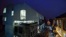 Dusk sets over both buildings