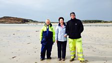 Helen with Tresco Harbour Master Henry Birch (left) and Editor of the Tresco Times, Alasdair Moore (right).