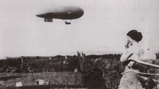 An airship flying out of Luce Bay in Scotland