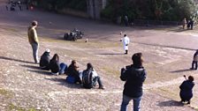 Spectators viewing the driving tests from the banking