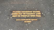 The message has been spray painted onto pavements in the city.