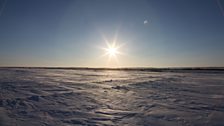 A weak sun does nothing to warm the frozen steppes of the Akmola region of Kazakhstan, February 2014.