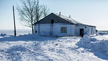 The houses in Krasnaya Polyana are single-storey and their gardens shade into the steppes.