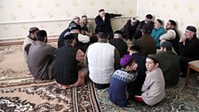 Chechen boys sit on the edge of the circle. They are too young to take part in the ritual…