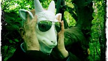 Iain Sinclair with a goat mask