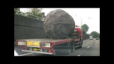 The crew transport a giant meatball, ready for lunch