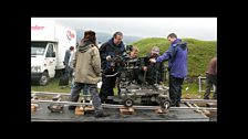 The camera crew board the train to Rome