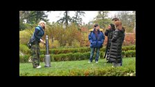 A crowd gather to see Alex demonstrate her new pogo stick