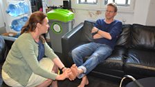 Podiatrist Emma Supple explains to Simon that he has a high instep which is a good foot for wearing high heels.