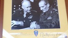 The signed picture of Eisenhower and Montgomery hangs proudly above the bar