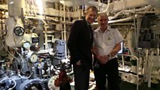 Jeremy is shown around below deck on HMS Belfast