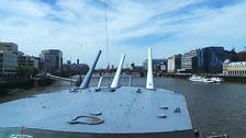 The view on-board HMS Belfast looking west toward the Houses of Parliament and Big Ben