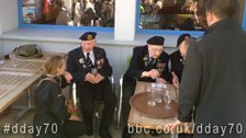 Veterans stop for lunch in Arromanches