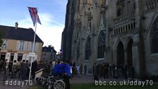 Crowds gather outside Bayeux Cathedral